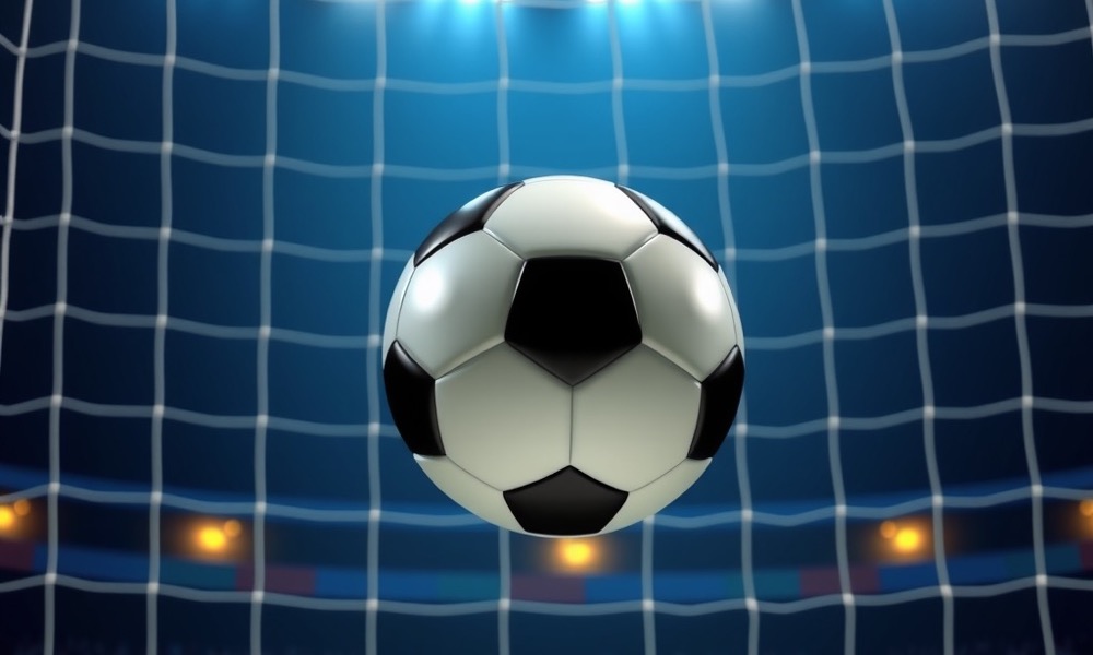 Online Casino India football betting page with football flying into a goal net under stadium lights